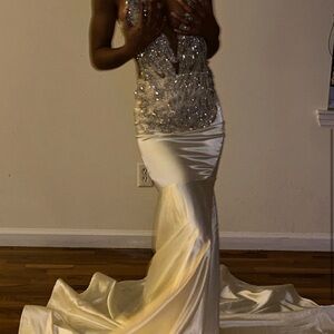 Off white colored floor length dress